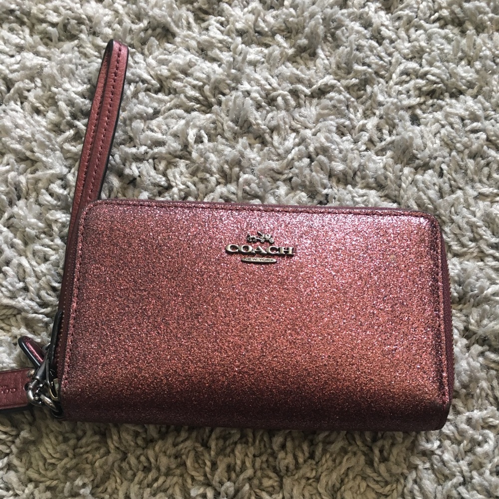 Coach wristlet in burgundy glitter